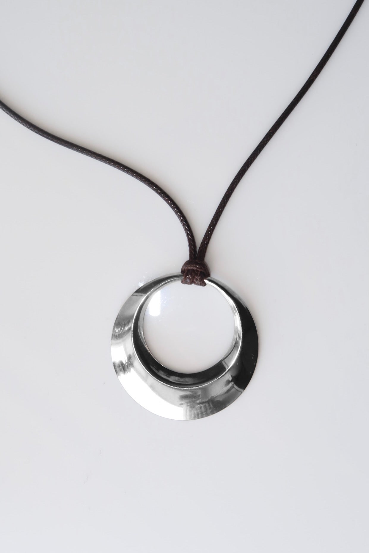 NASUTRIUM - SILVER CIRCLE IN STAINLESS STEEL