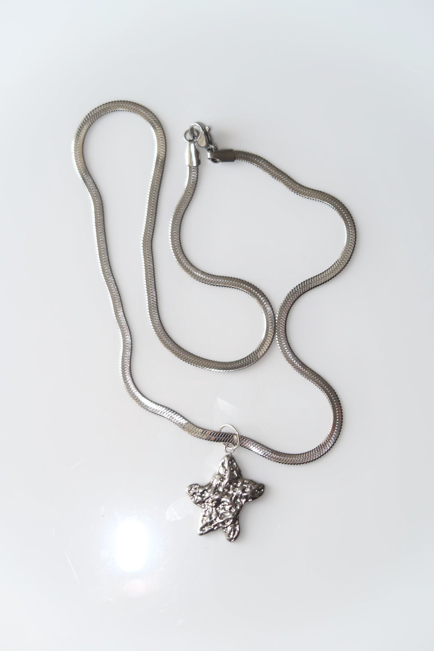 KALMIA - SILVER STAR NECKLACE IN STAINLESS STEEL