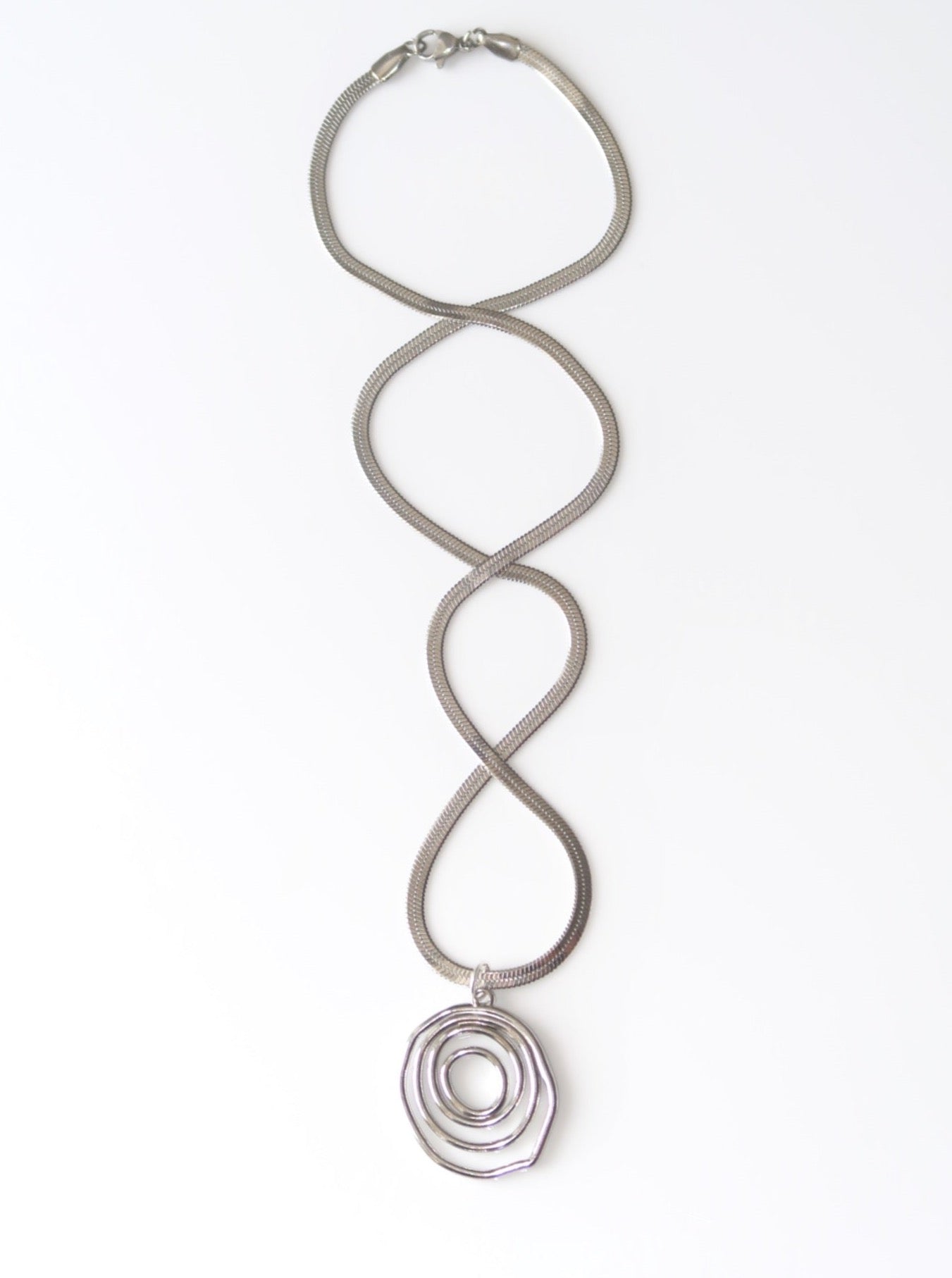 ZINNIA - SILVER SWIRL NECKLACE IN STAINLESS STEEL